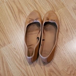 Tan ballet flats